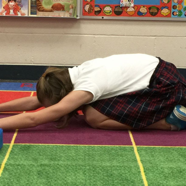 A Kids Yoga Sequence That Teaches Gratitude Hero Image