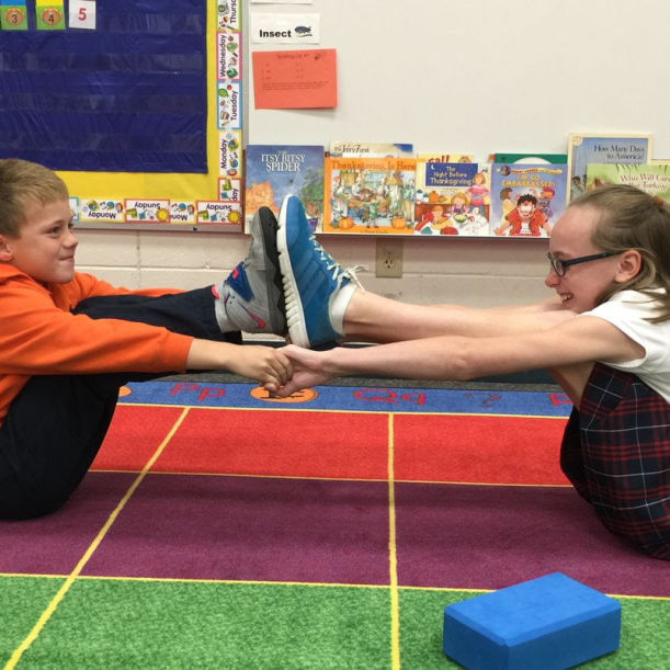 A Kids Yoga Sequence That Teaches Gratitude Hero Image