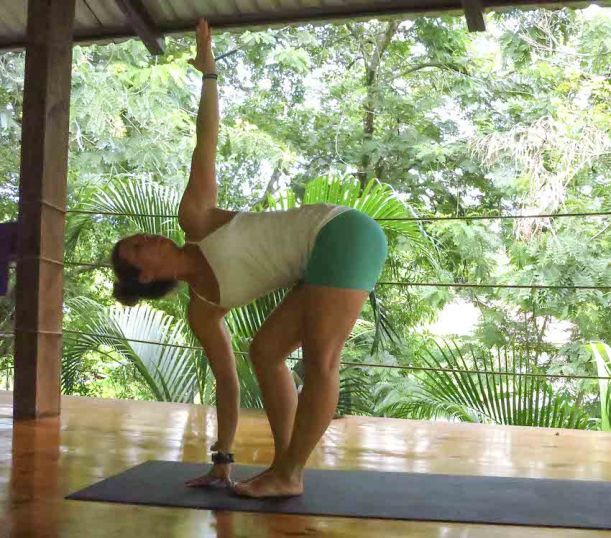 10 Yoga Moves To Get Your Summer Sweat On Hero Image