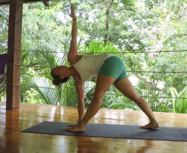 10 Yoga Moves To Get Your Summer Sweat On Hero Image