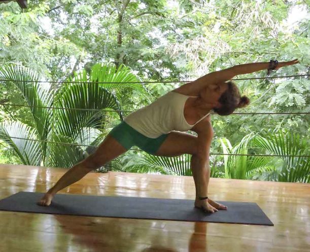 10 Yoga Moves To Get Your Summer Sweat On Hero Image