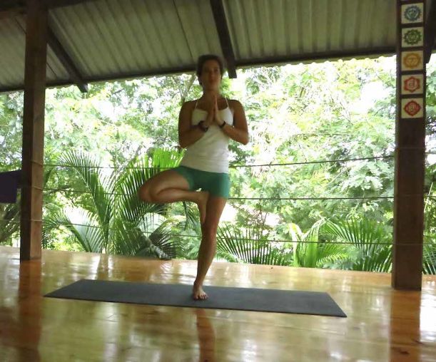 10 Yoga Moves To Get Your Summer Sweat On Hero Image