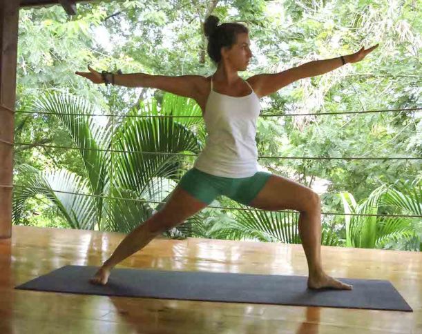 10 Yoga Moves To Get Your Summer Sweat On Hero Image