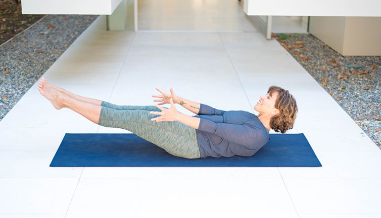 7 Invigorating Yoga Poses to Sweat Your Asana Off Hero Image