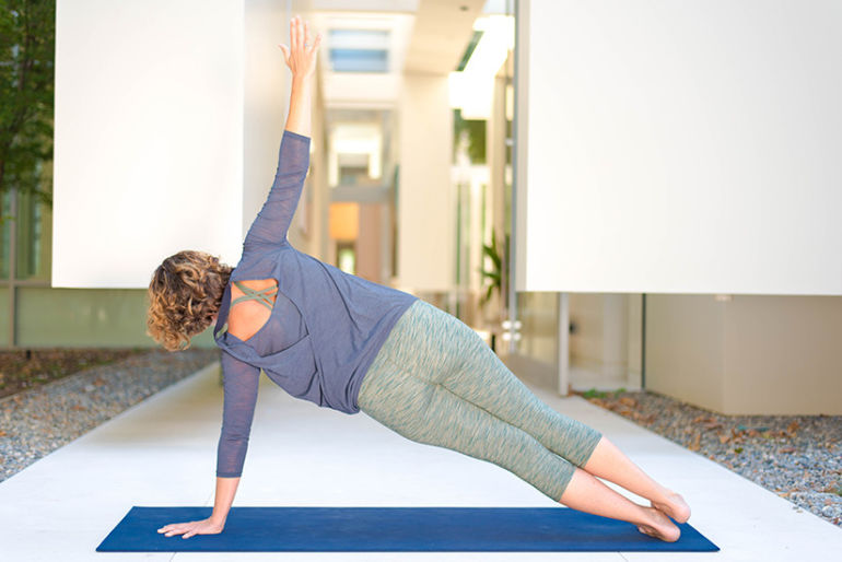 7 Invigorating Yoga Poses to Sweat Your Asana Off Hero Image