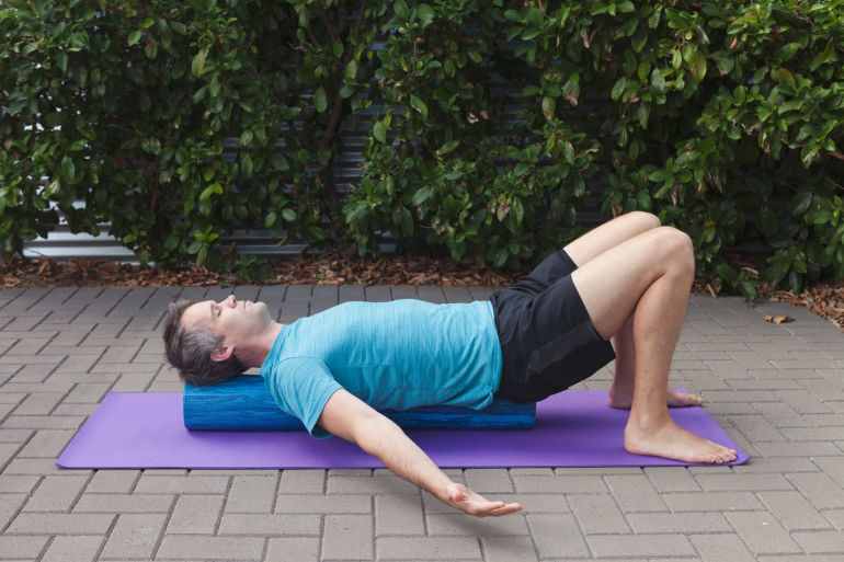 6 Foam-Roller Stretches To Ease Neck And Shoulder Pain Hero Image