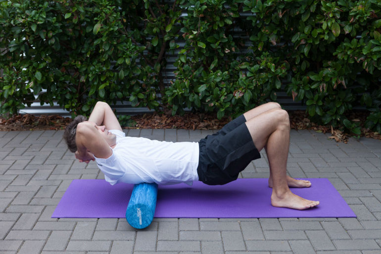 6 Foam-Roller Stretches To Ease Neck And Shoulder Pain Hero Image