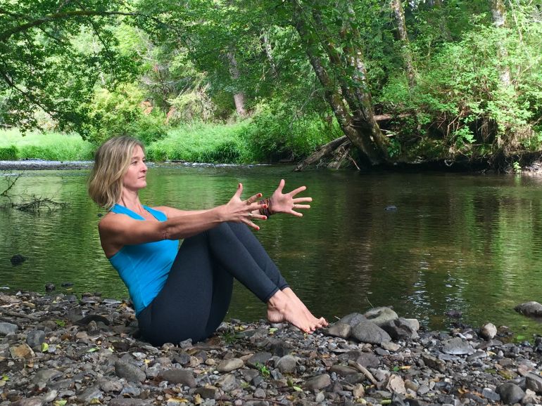 This Calming Yoga Flow Will Keep You Centered All Summer Hero Image