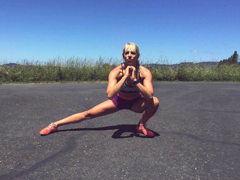 A Full-Body Medicine Ball Workout You Can Do In 12 Minutes Hero Image