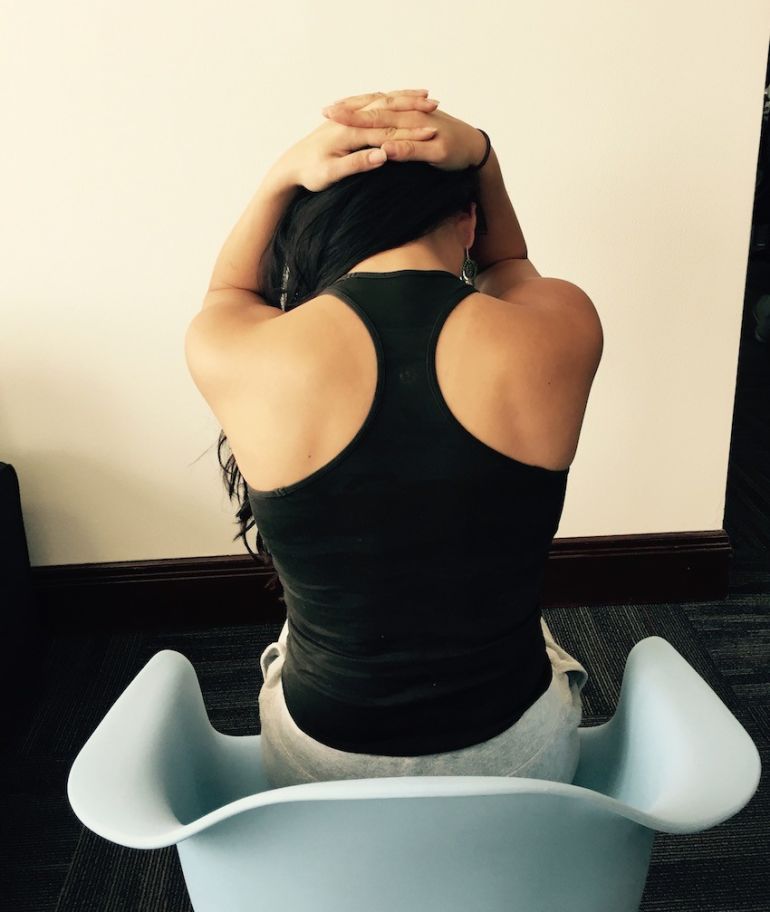 3 Simple Yoga Stretches To Soothe Neck Tension If You Sit All Day Hero Image