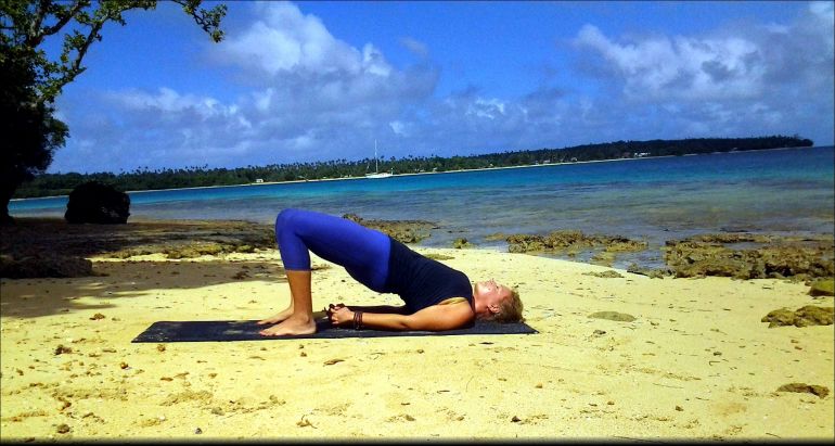 A Quick + Easy Yoga Sequence To Alleviate Headaches Hero Image