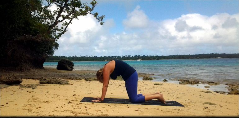 A Quick + Easy Yoga Sequence To Alleviate Headaches Hero Image