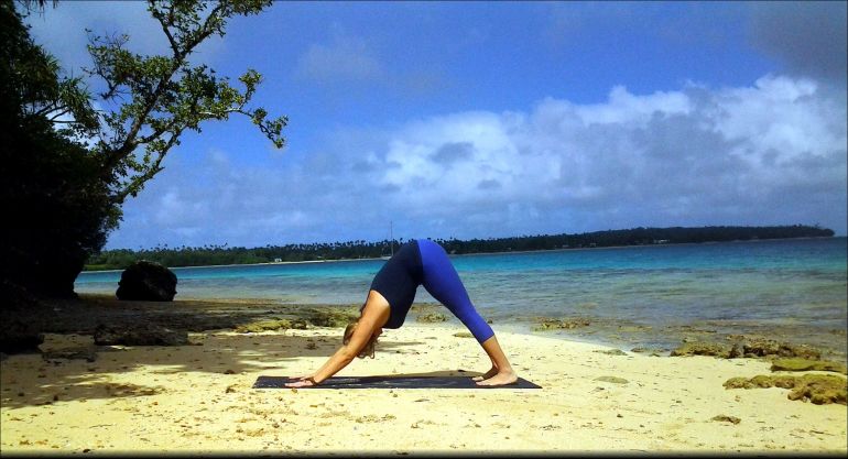 A Quick + Easy Yoga Sequence To Alleviate Headaches Hero Image