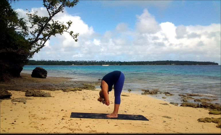 A Quick + Easy Yoga Sequence To Alleviate Headaches Hero Image