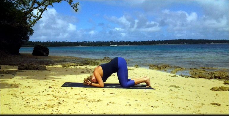 A Step-By-Step Guide To Nailing A Headstand Without Hurting Yourself Hero Image