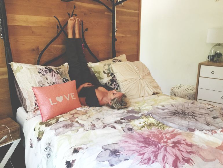 A Relaxing Yoga Sequence You Can Do In Bed Hero Image