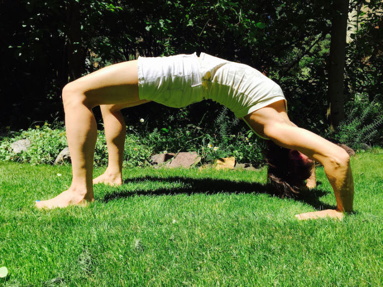 8 Great Yoga Poses To Stretch Your Arms & Shoulders Hero Image