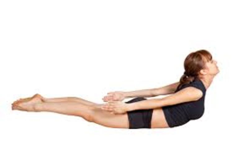 A Yoga Sequence To Help You Digest After Tonight's Dinner (Or Any Indulgent Meal) Hero Image