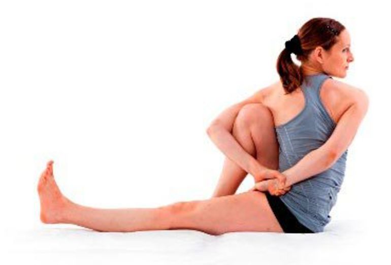 A Yoga Sequence To Help You Digest After Tonight's Dinner (Or Any Indulgent Meal) Hero Image