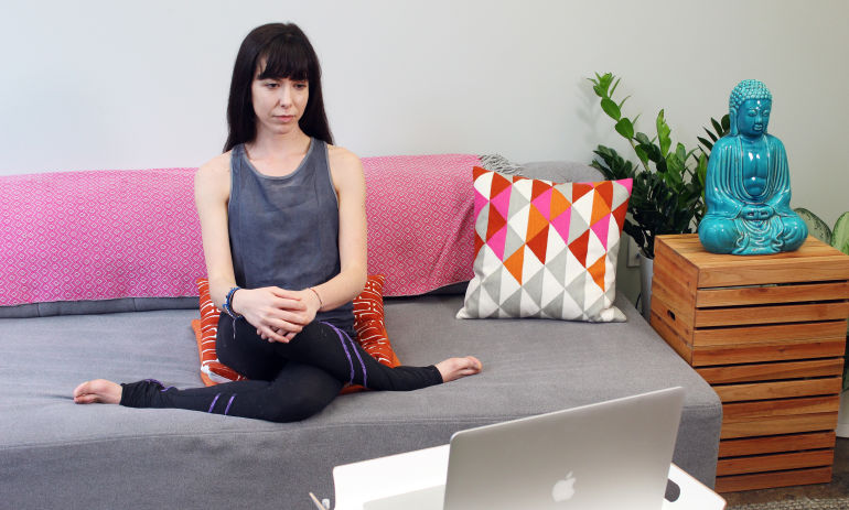 Yoga Poses You Can Do While Binge-Watching Netflix Hero Image