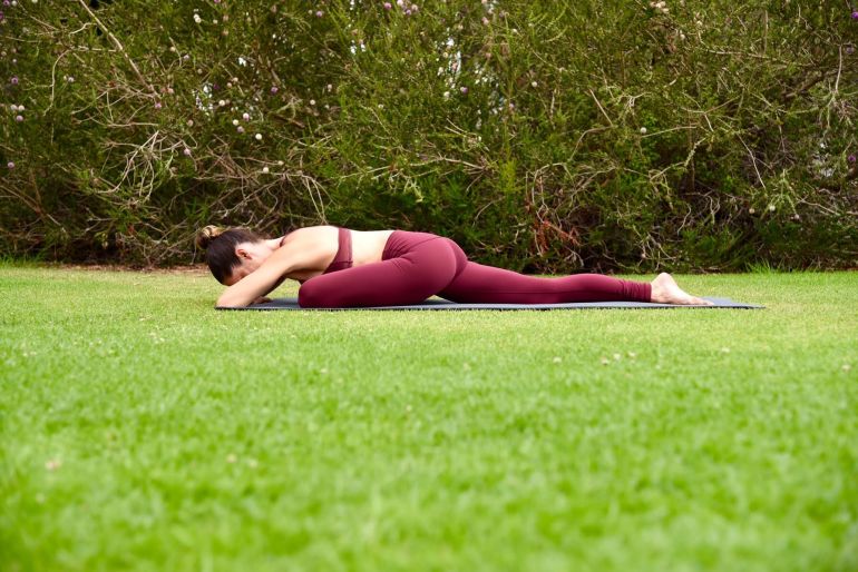 A Simple Yoga Flow To Strengthen Your Post-Baby Body Hero Image