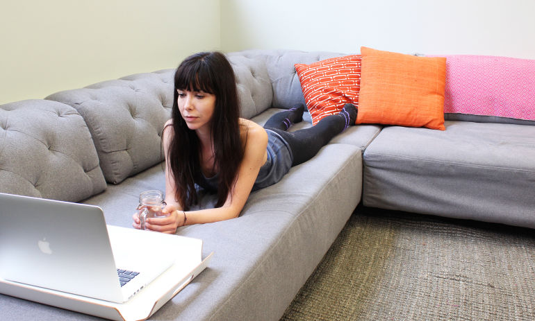 Yoga Poses You Can Do While Binge-Watching Netflix Hero Image