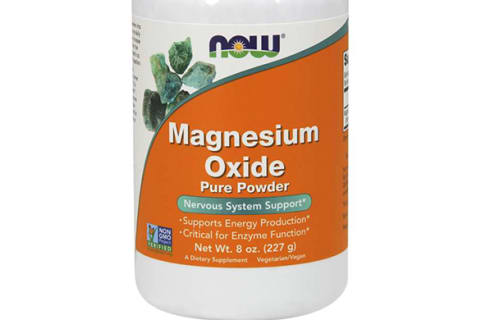 Magnesium oxide supplement bottle with orange label