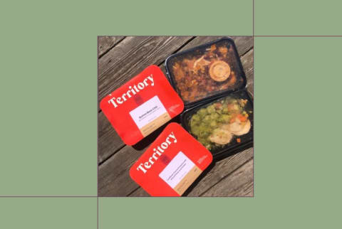 Best Keto Meal Delivery Territory Foods boxes on table background 