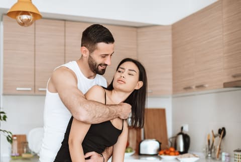woman unreceptive to physical affection from male partner