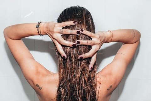 Woman washing hair 