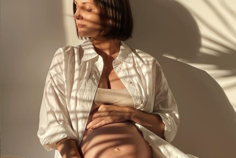 Pregnant Woman And Sunlight