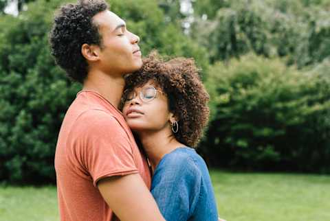 Couple Embracing in a Park Couple Embracing in a Park