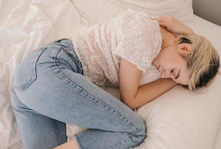 The Sneaky Reason Your Sleep Could Be Suffering On Your Period