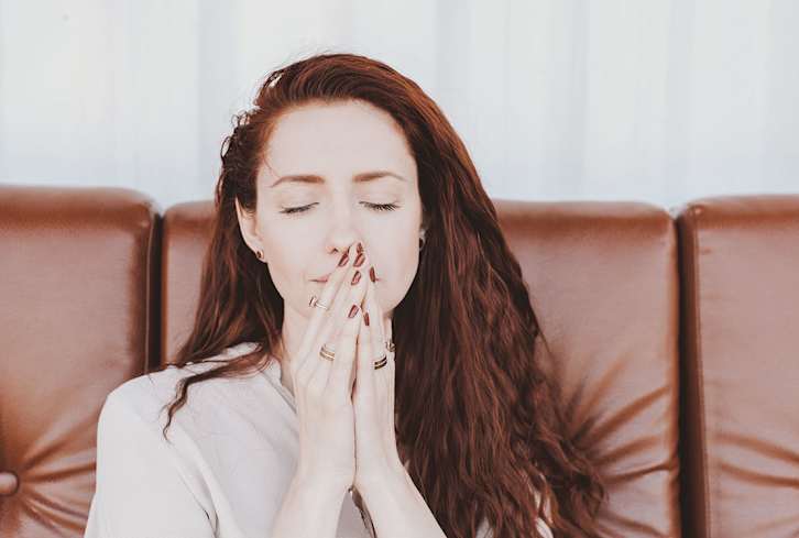Natural Practices To Help Turn Your Mood Around, From A Reiki Expert