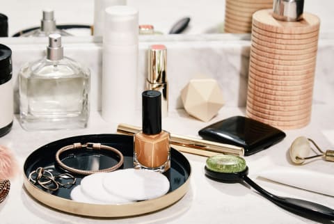 Makeup & Skincare Products on a Bathroom Counter - Nail Polish, Lipstick, Body Lotion Perfume