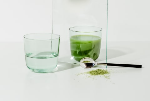Green Powder and a Glass of Water