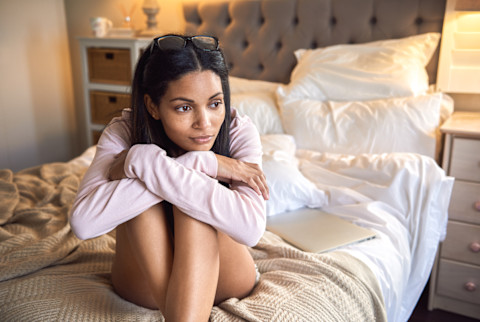 Woman Daydreaming On Her Bed Woman Daydreaming On Her Bed