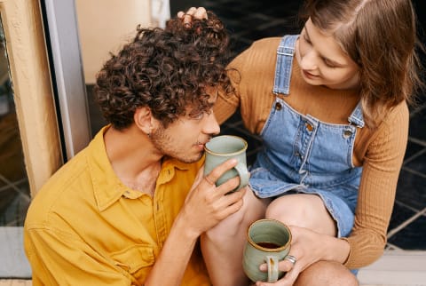 Content Couple Enjoying Morning Coffee Togther