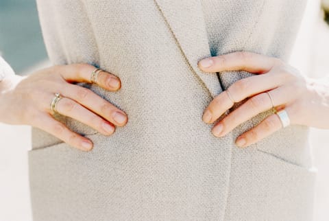 Woman with Hands on Hips in Winter Coat