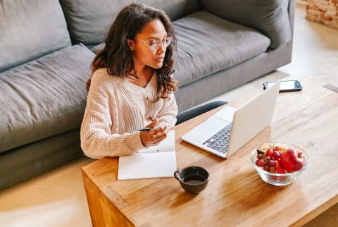 Woman Working Remotely in Her Living Room