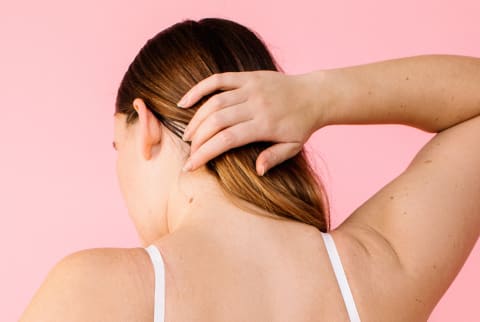 Woman Touching Her Hair