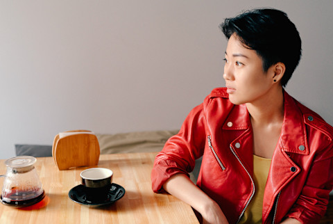 Thoughtful Woman in a Cafe Thoughtful Woman in a Cafe