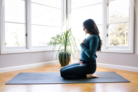 Pregnant Woman Doing Yoga