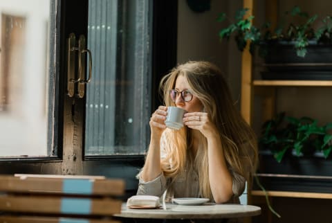 woman drinking coffee