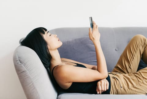 Woman Checking Her Phone Woman Checking Her Phone