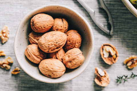 Bowl of Walnuts and a Nut Cracker