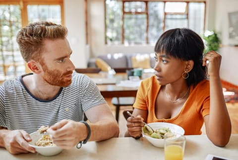 Tense Couple Eating Breakfast Together