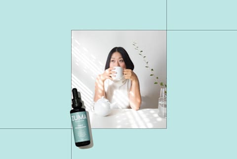 women drinking cup of tonic