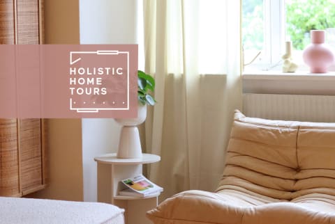 holistic home tour logo on living room phto with pink vases and cream sofa