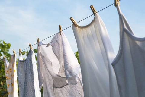 White Laundry Hanging To Dry On A Clothes-Line